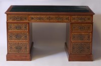 Lot 1660 - A Victorian walnut twin pedestal writing desk,...