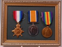 Lot 203 - A WW I trio to include 1914-15 Star, British...