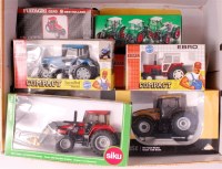 Lot 1213 - 9 boxed 1/32nd scale diecast tractor group, by...