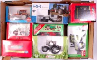Lot 1216 - 1/32nd scale diecast tractor group by Britains,...