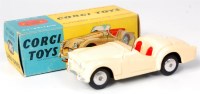 Lot 1643 - Corgi Toys, 301 Triumph TR2 sports car, cream...