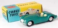Lot 1644 - Corgi Toys, 302 MGA sports car, dark metallic...