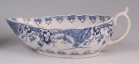 Lot 330 - An 18th century Worcester porcelain sauceboat,...