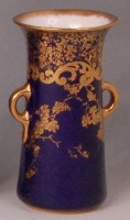 Lot 335 - A Royal Doulton porcelain twin handled...
