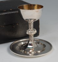 Lot 382 - A cased travelling communion set, comprising...