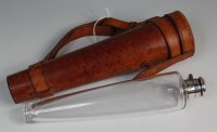 Lot 383 - A circa 1900 leather cased glass hunting flask,...