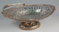 Lot 387 - An Edwardian silver pierced pedestal cake...
