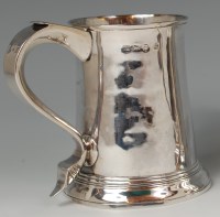 Lot 407 - An early George III silver tankard, having...