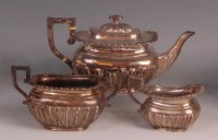 Lot 424 - An Edwardian silver three piece teaset,...