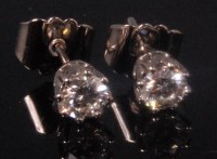 Lot 484 - A pair of contemporary 18ct white gold diamond...