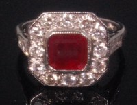 Lot 487 - An 18ct white gold ruby and diamond set dress...