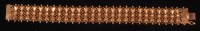 Lot 496 - A yellow metal meshlink bracelet, having...