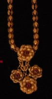 Lot 520 - An antique yellow metal cage link necklace,...