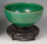 Lot 619 - A 17th/18th century Chinese green...