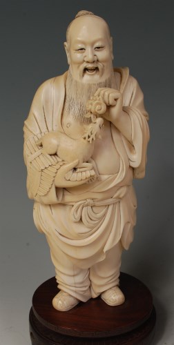 Lot 656 - An early 20th century Chinese carved ivory...