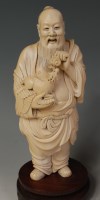 Lot 656 - An early 20th century Chinese carved ivory...
