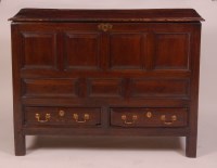 Lot 870 - A circa 1700 joined oak mule chest, the top on...