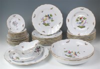 Lot 726 - # A Herend porcelain eight place setting...
