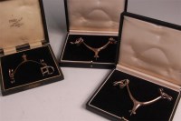 Lot 827 - *A cased silver spur, with attached fittings,...