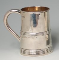 Lot 829 - A late Victorian silver tankard, in the early...