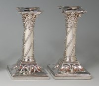 Lot 832 - A pair of late Victorian silver candlesticks,...
