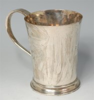 Lot 848 - A Georgian style silver tankard, having...