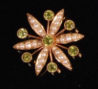 Lot 911 - A 15ct gold seed pearl and green peridot set...