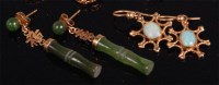 Lot 950 - A pair of Chinese yellow metal and jade ear...