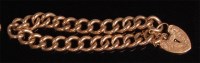 Lot 958 - A 9ct gold curblink bracelet, having engraved...