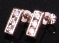 Lot 979 - A pair of contemporary 18ct white gold diamond...