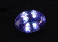 Lot 983 - An oval cut loose tanzanite, approx 3.5ct