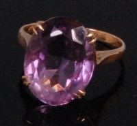 Lot 991 - A modern 9ct gold amethyst set ladies dress...