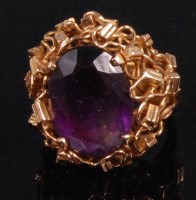 Lot 1009 - A ladies 9ct gold studio jewellery amethyst...