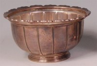 Lot 875 - A George II silver footed sugar bowl, of lobed...