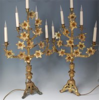 Lot 1035 - # A pair of continental gilt brass five light...