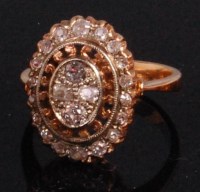 Lot 904 - An early 20th century yellow metal diamond set...