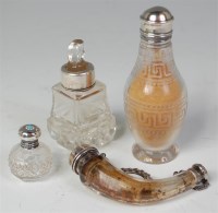 Lot 1056 - A late Victorian clear glass cornucopia shaped...