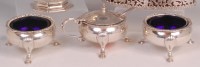 Lot 483 - A Georgian style silver three piece cruet set,...