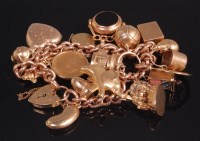 Lot 533 - A 9ct gold curblink bracelet containing...