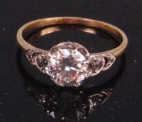 Lot 554 - A ladies yellow gold diamond solitaire ring,...