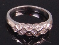 Lot 576 - A contemporary 14ct gold diamond set dress...