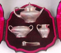 Lot 479 - A late Victorian cased bachelors three piece...