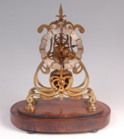 Lot 754 - A Victorian brass skeleton clock, having a...