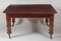 Lot 779 - A Victorian mahogany extending dining table,...