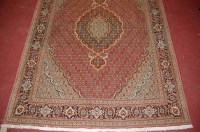 Lot 782 - A Persian woollen Tabriz type rug, having...