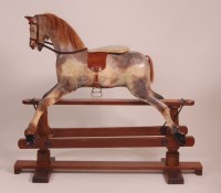 Lot 807 - A circa 1900 childs dapple-grey rocking horse,...
