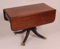 Lot 818 - A Regency mahogany pedestal Pembroke table,...