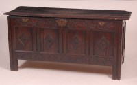 Lot 831 - A circa 1700 joined oak four panel coffer, the...