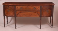 Lot 832 - A Regency mahogany bowfront sideboard, having...