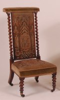 Lot 833 - A Victorian rosewood prie-deux, having...